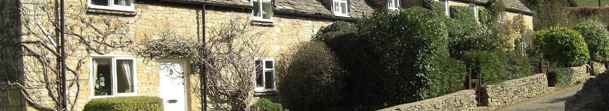 Row of stone cottages, used on the company page.